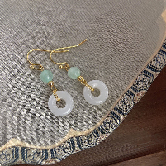 Pendientes chinos redondos blanco jade elegantes retro chino